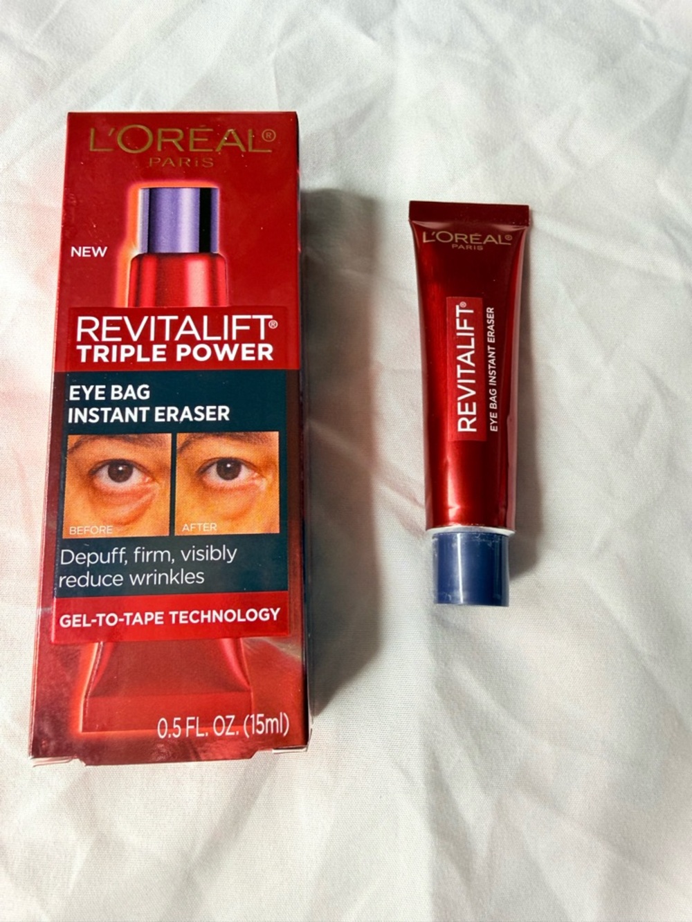 L'Oreal Revitalift Triple Power Eye Bag Instant Eraser - Red with Blue Cap